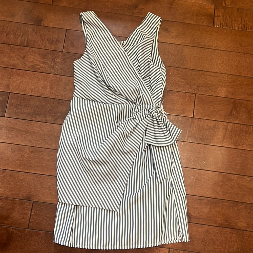 Habitual girls dress size 12. Worn twice and was dry cleaned